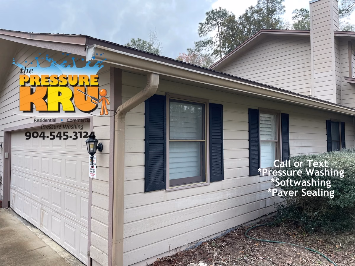 After soft washing mold-covered wood siding home in Orange Park Golf and Country Club.
