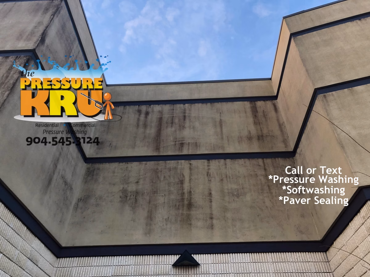 Commercial Stucco cleaning before Softwash at Orange Park Mall.