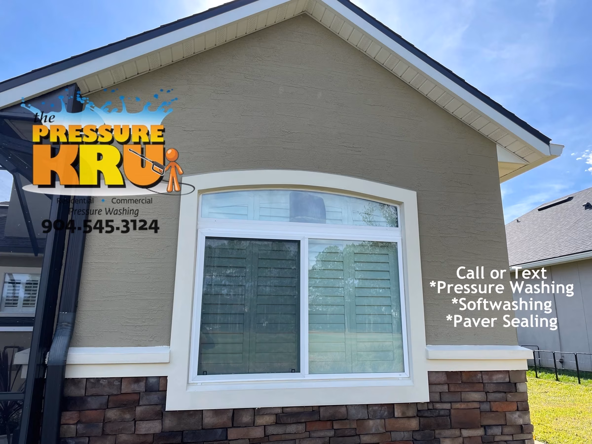 Freshly cleaned stucco home after low-pressure soft washing in Bartram Springs