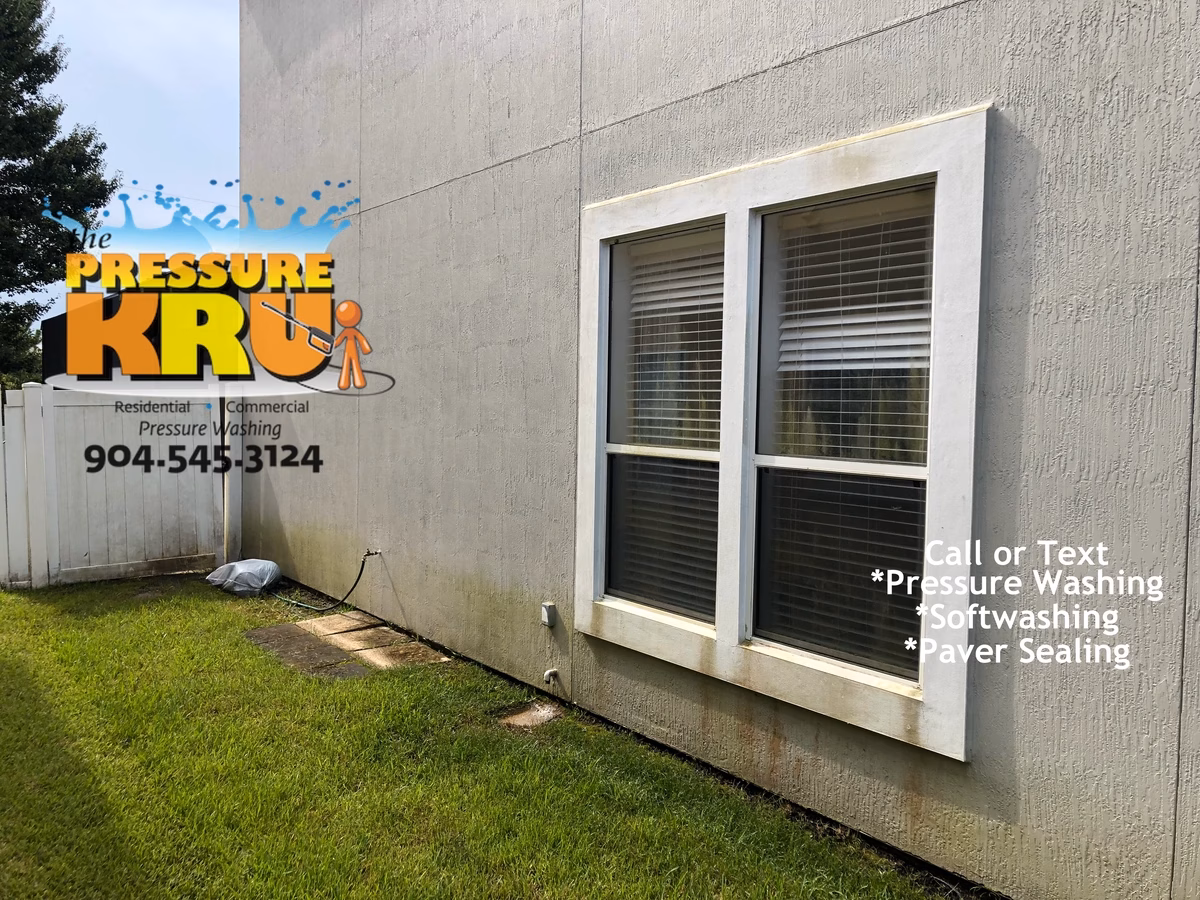 Professional exterior house washing for a stucco home in Julington Creek Plantation Before.
