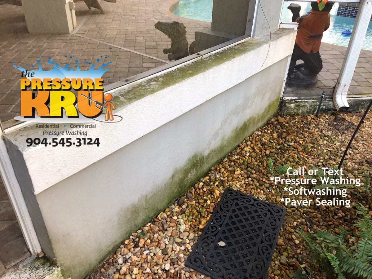 Exterior stucco before cleaning service for Deercreek home in Jacksonville Florida.