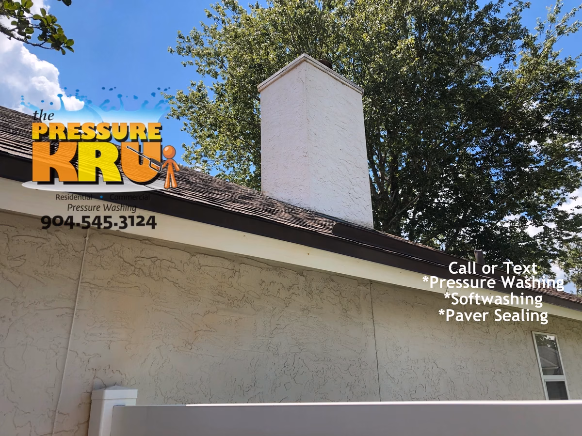 Clean stucco exterior after professional house washing in Greenbriar neighborhood.