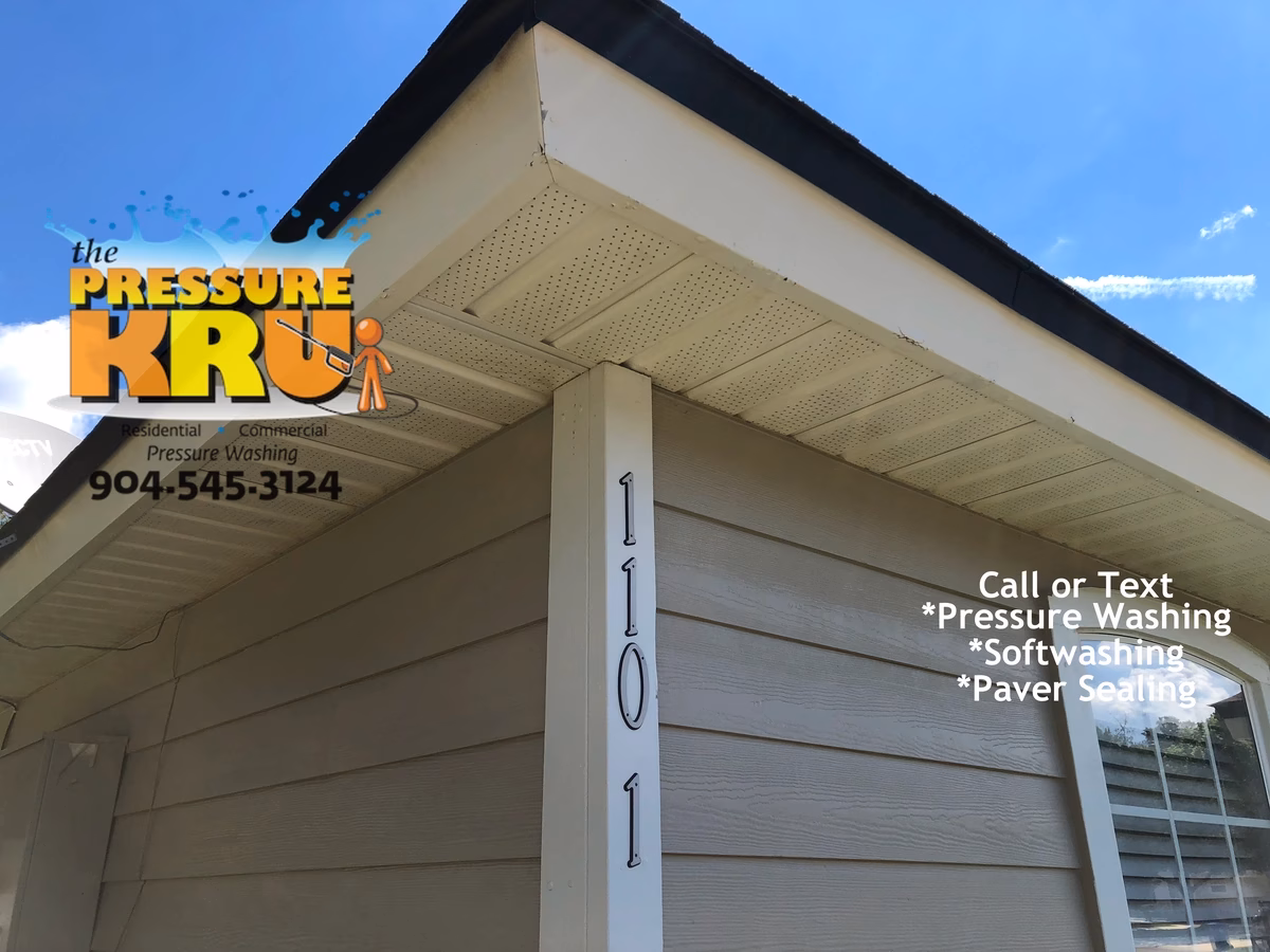 close-up image showing a soft wash exterior cleaning in Julington Creek neighborhood removing mold without damaging home.