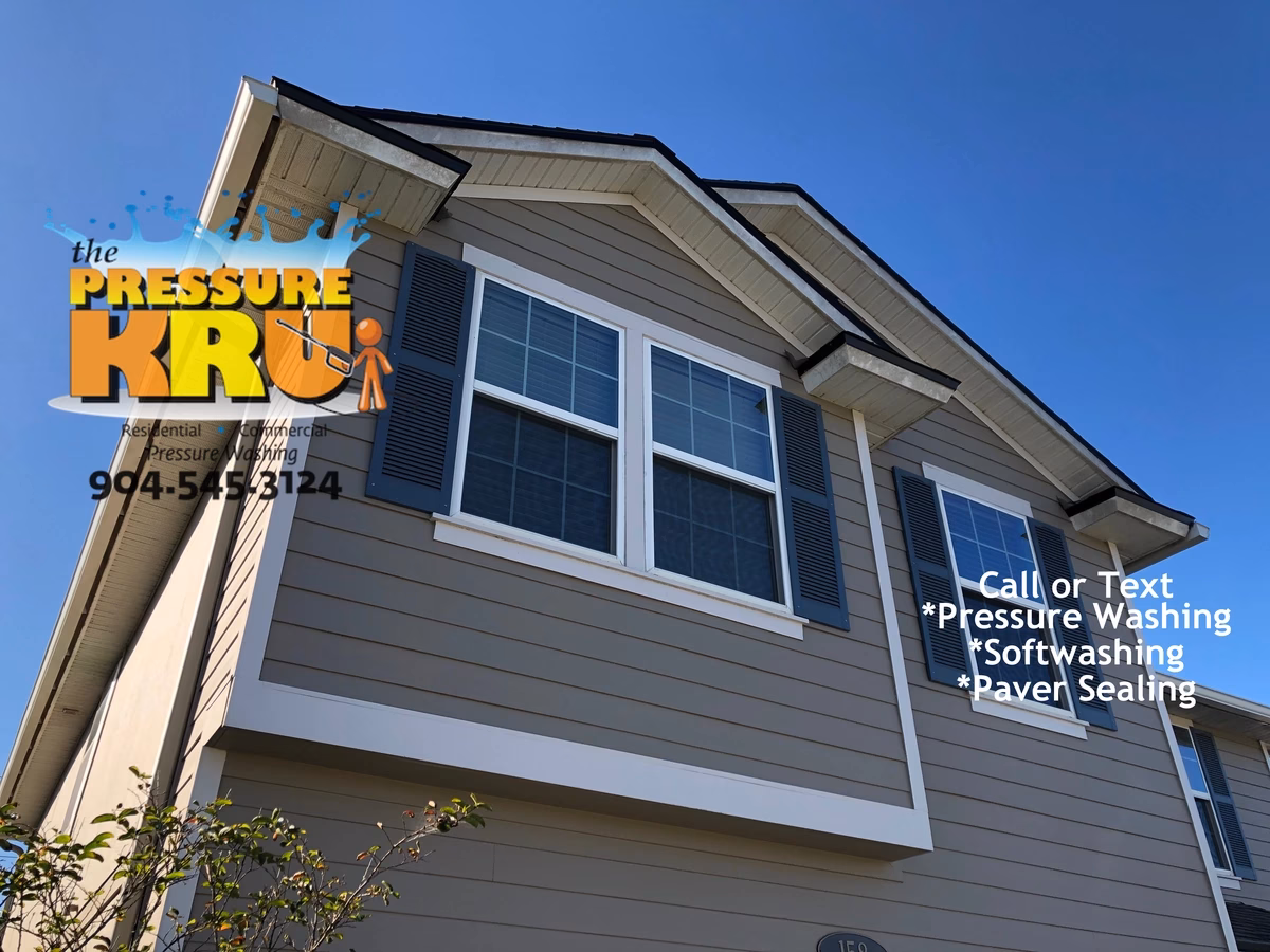 Before cleaning a cement siding home in Bartram Park neighborhood.