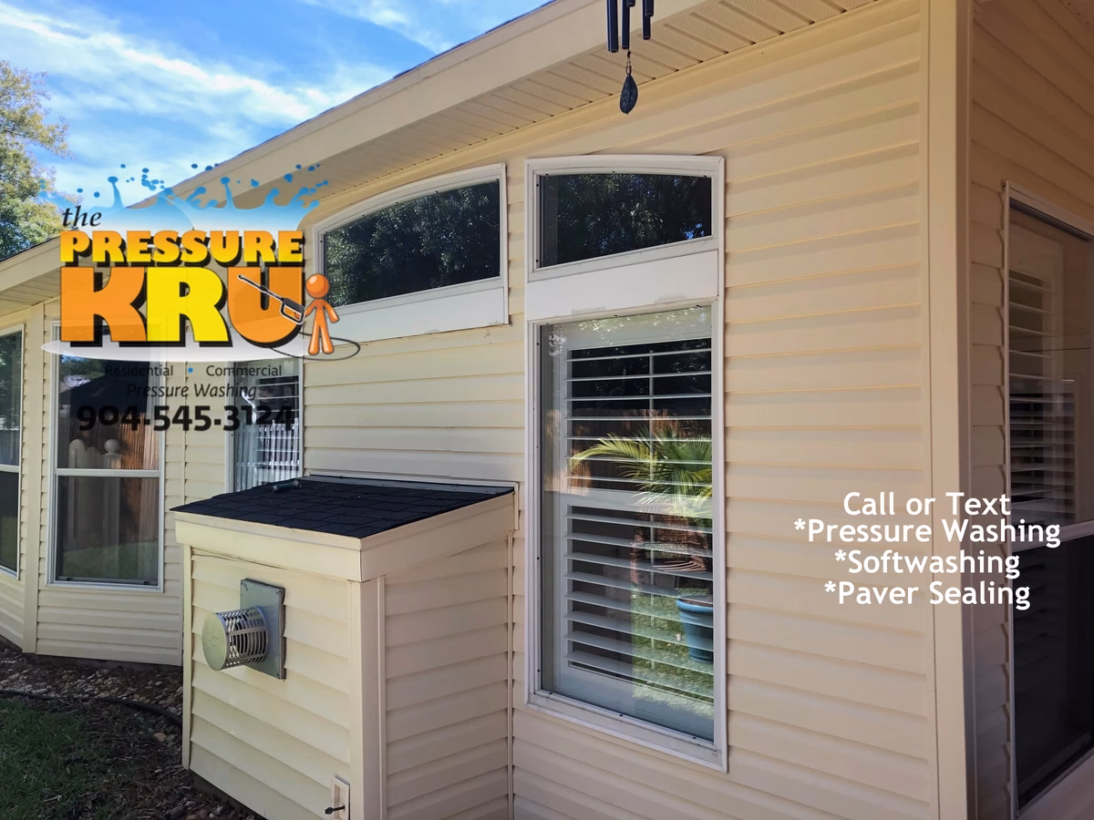 Vinyl siding after cleaning transformation removing mold and mildew from a Julington Creek home.