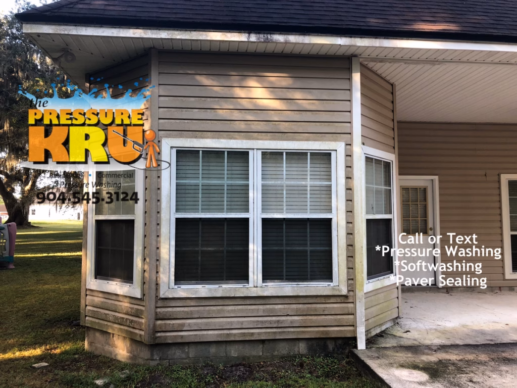Vinyl siding cleaning results before professional soft wash for an Aberdeen home.