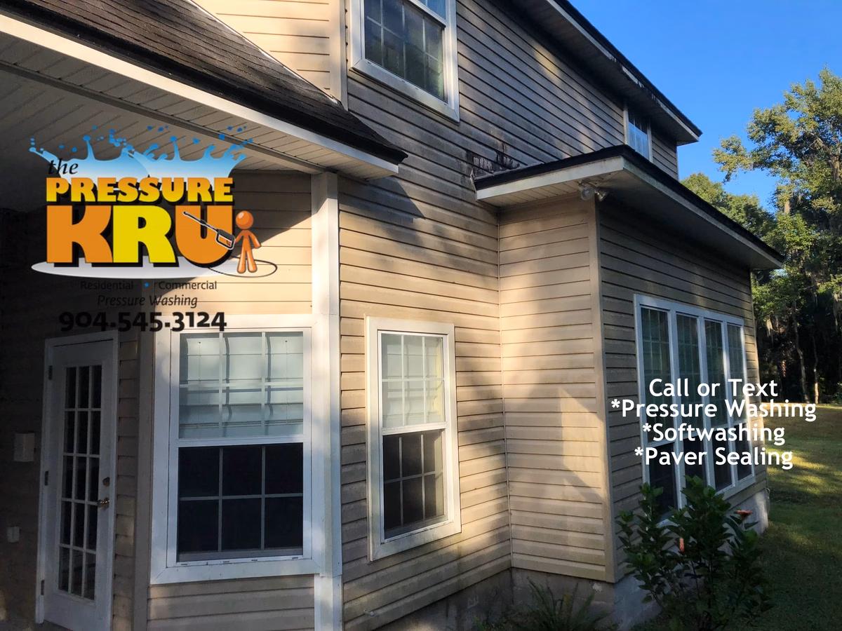House washing before showing dirty vinyl siding for home located in Durbin.