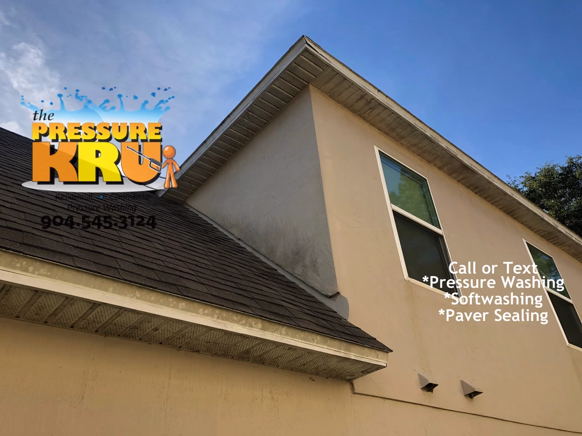 Residential exterior soft washing service for stucco house in Baymeadows.