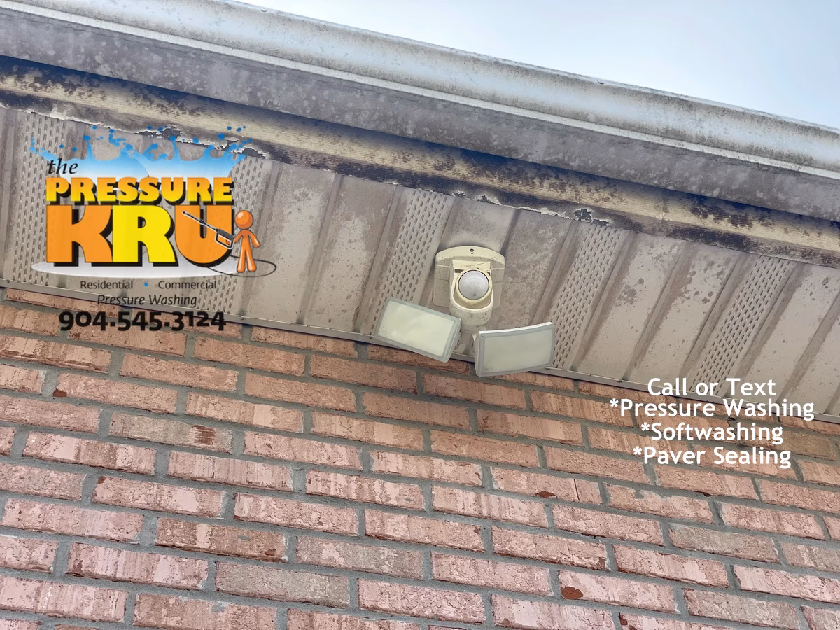 Brick home exterior before safely cleaning with low-pressure soft washing in St Johns FL