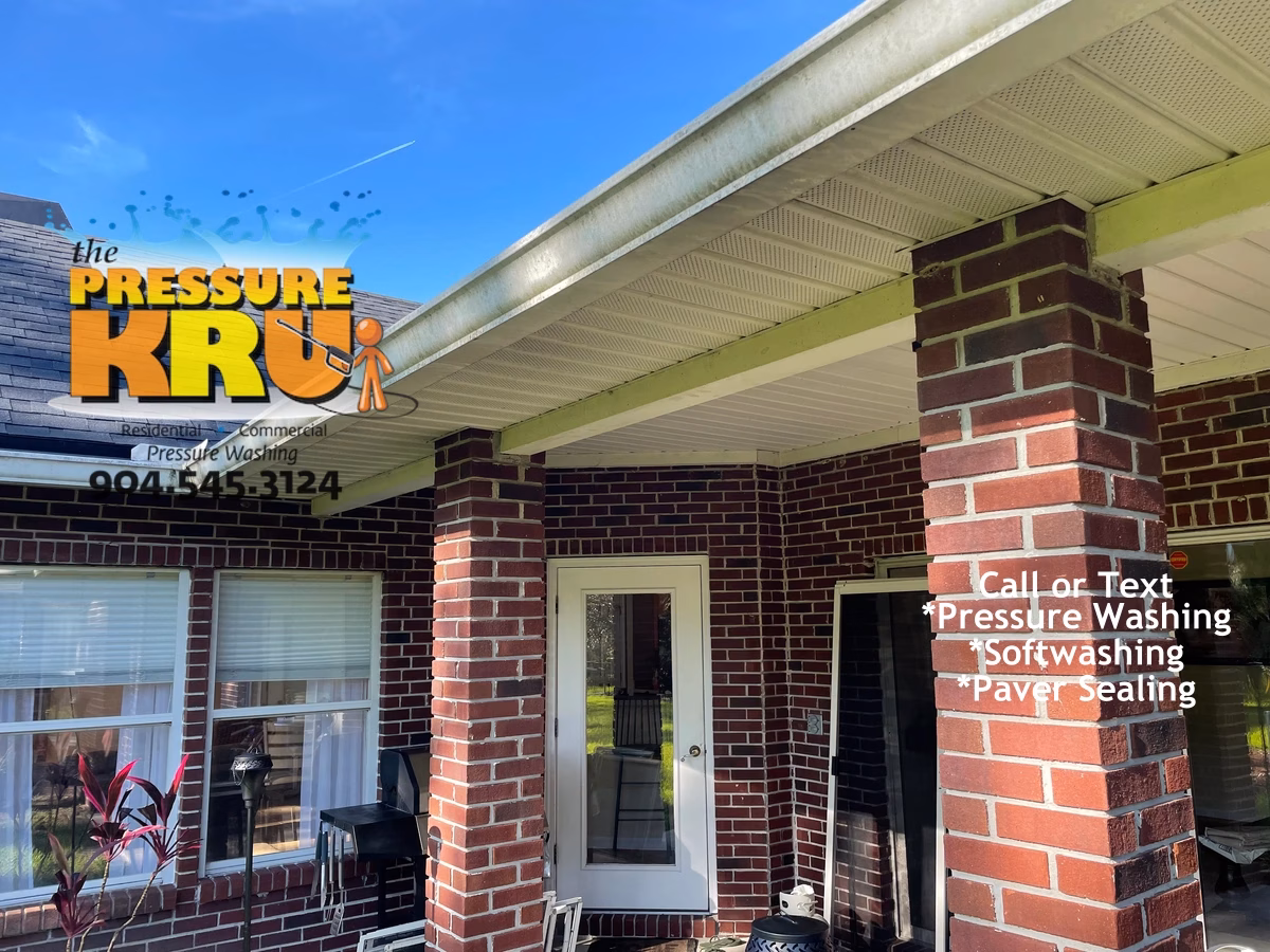 Residential brick house before professional brick exterior cleaning for a home in Jacksonville FL
