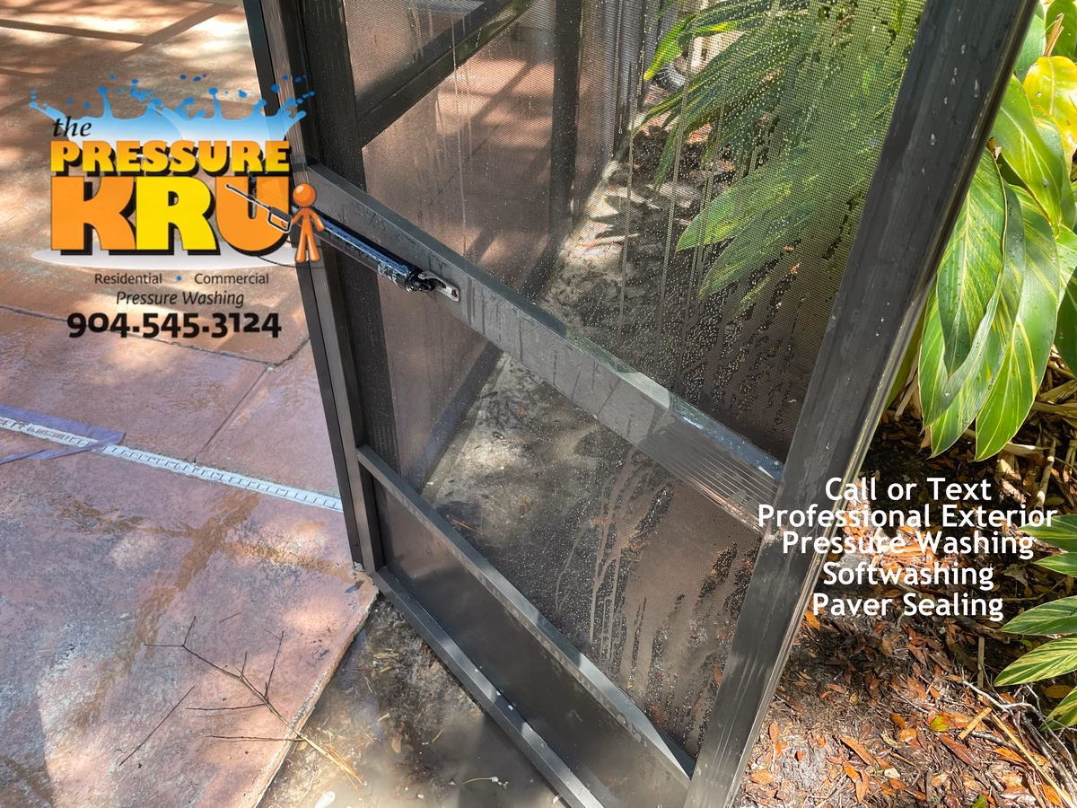 Screened Pool Enclosure after professional exterior cleaning in Jacksonville, FL.