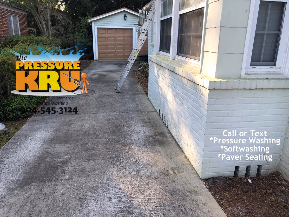 Painted Brick Home exterior cleaning before utilizing low-pressure soft wash methods for a home near Greenland Chase