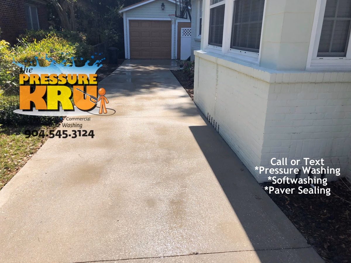 Painted Brick Home exterior cleaning after utilizing low-pressure soft wash methods for a home near Greenland Chase
