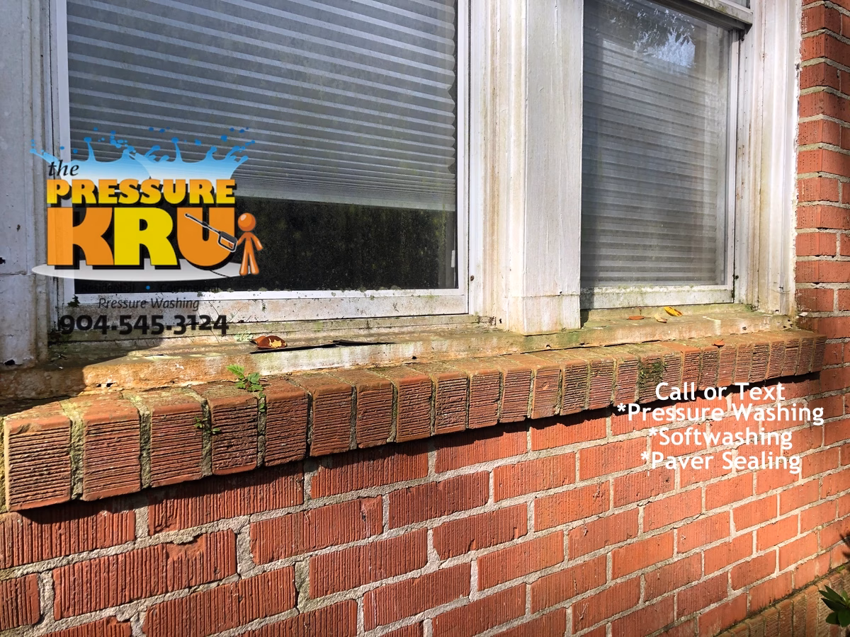 Delicate older brick home exterior cleaning in St Johns FL before low-pressure soft washing. This older brick home grout joints were already loose and falling out.