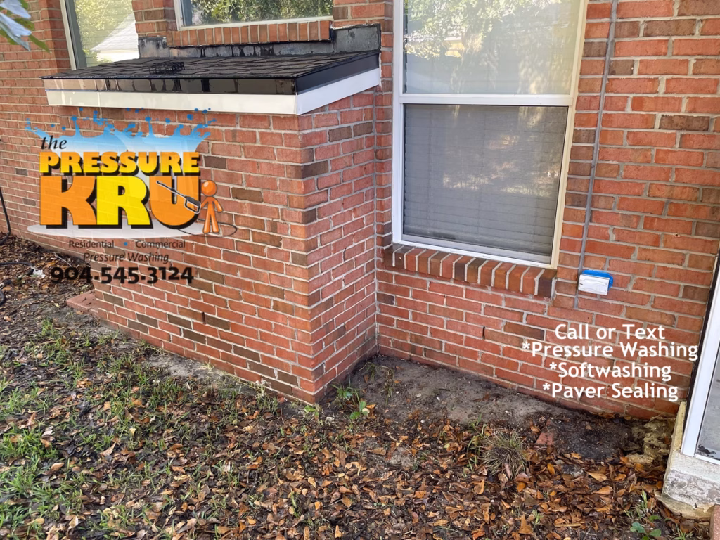 Exterior brick home after cleaning performed by softwashing expert in St Johns FL