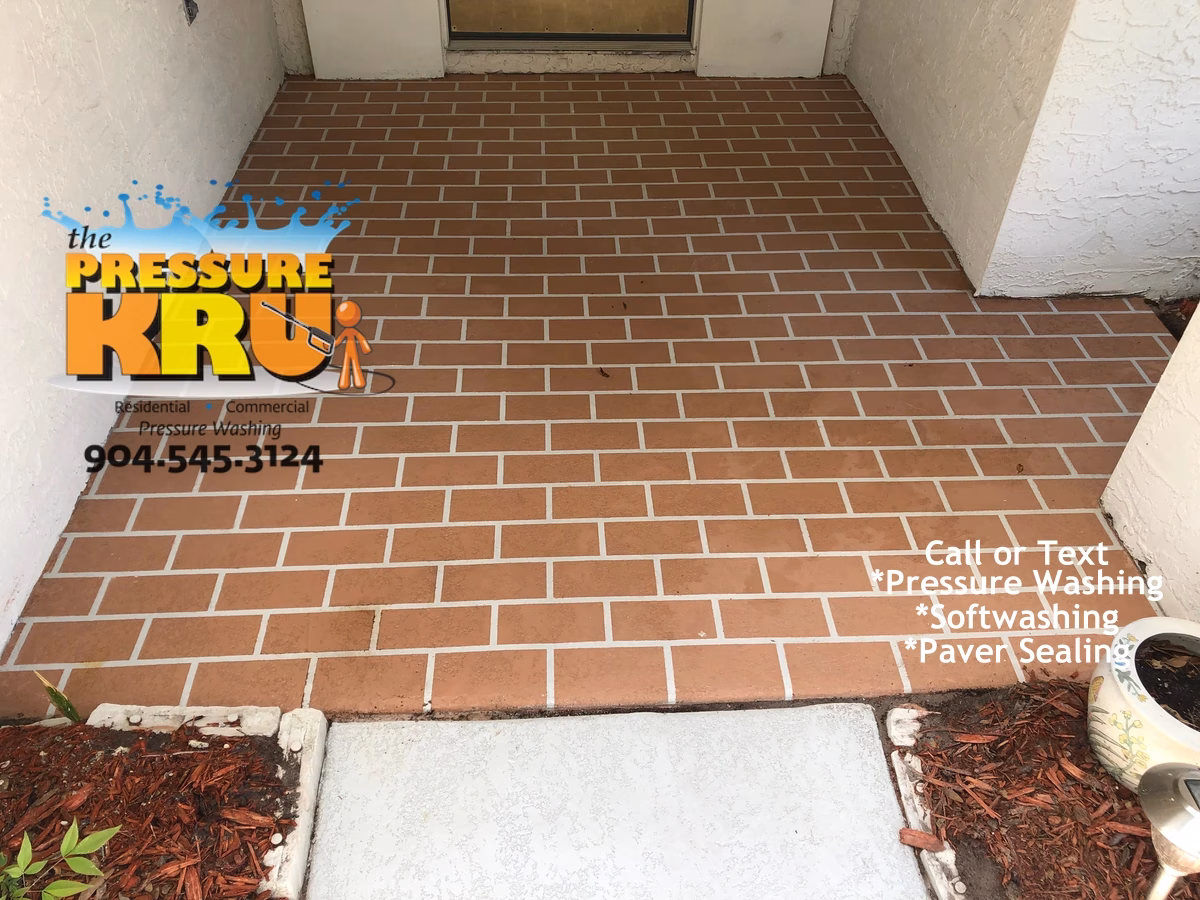 Professional brick exterior cleaning service showing stain removed in Jacksonville FL