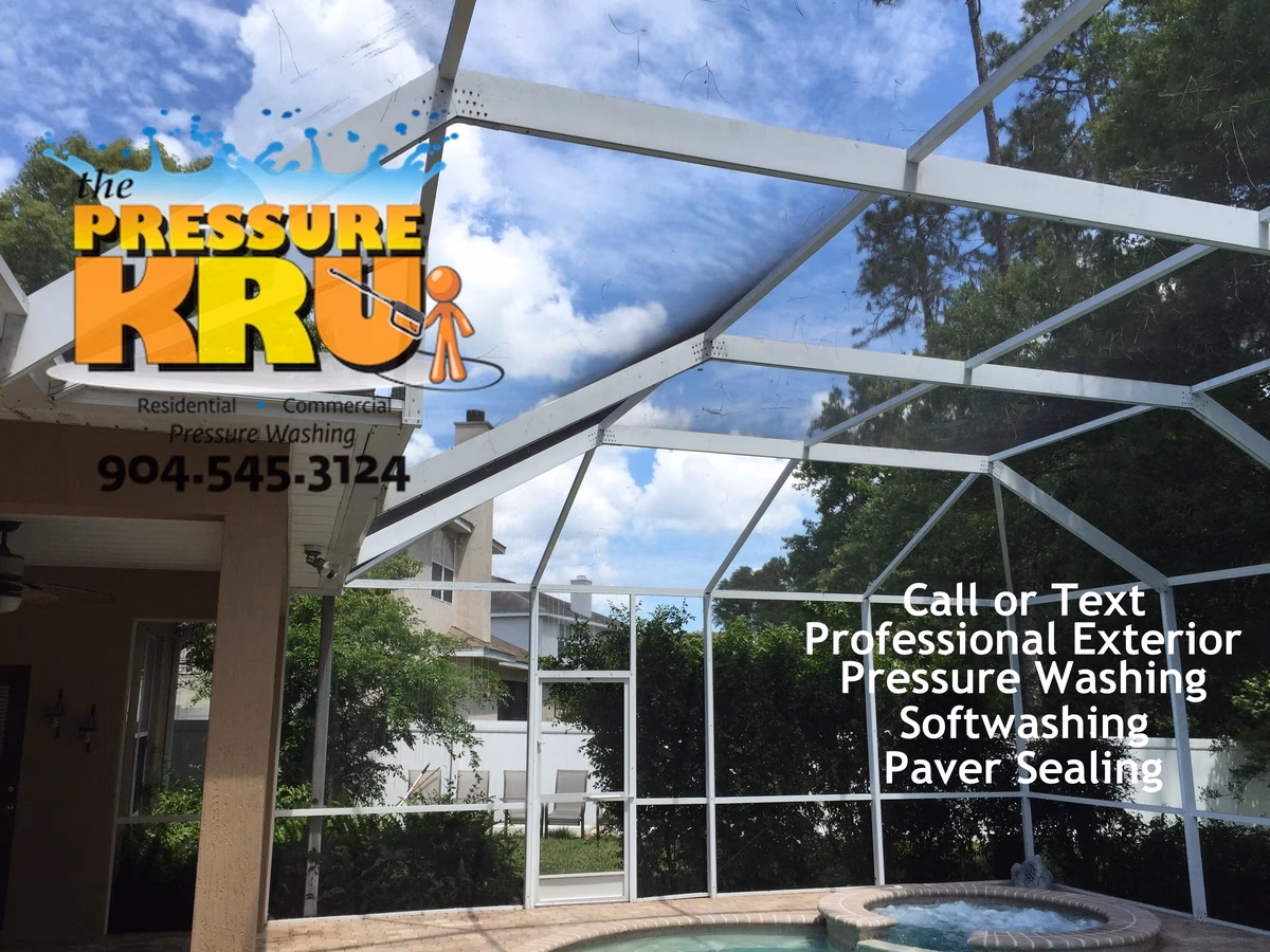 Freshly soft washed screen enclosure in Jacksonville, FL with clean screens and restored aluminum framing.