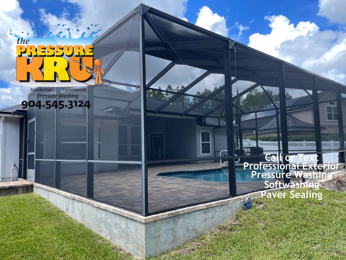 Pool enclosure after soft washing in St. Johns, FL with fresh, clean screens and restored appearance.
