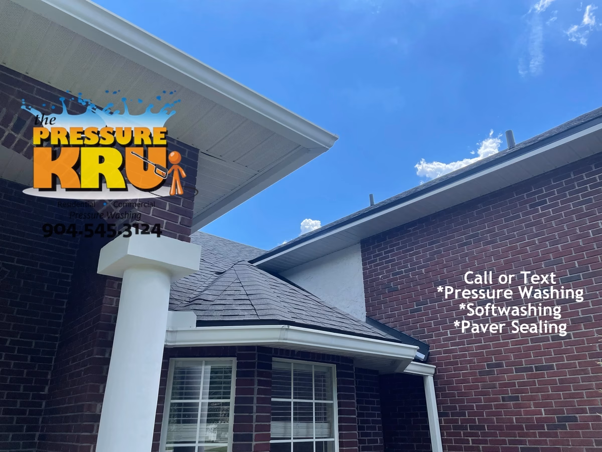 Residential brick exterior before soft washing in Sawgrass brightening trim