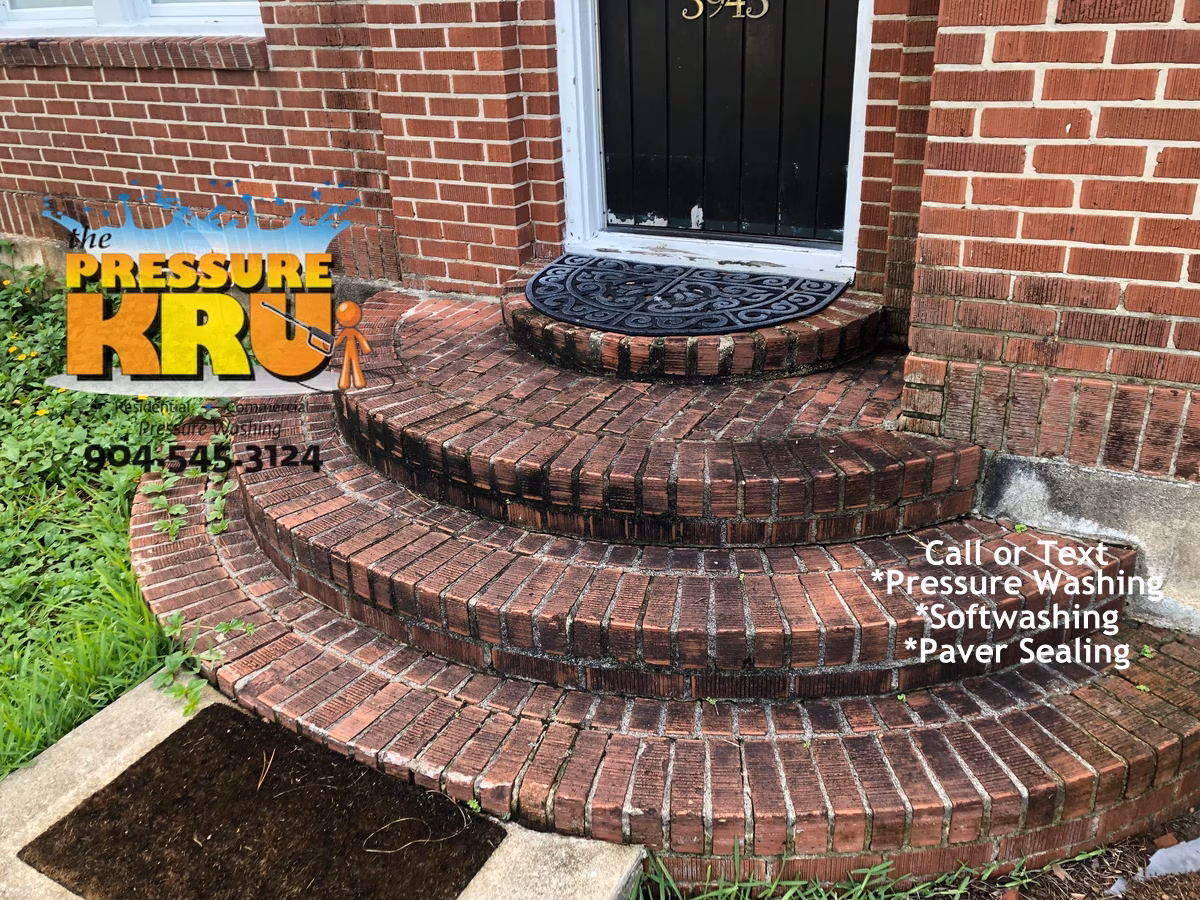 Brick home patio exterior cleaning before removing black mold in Jacksonville FL