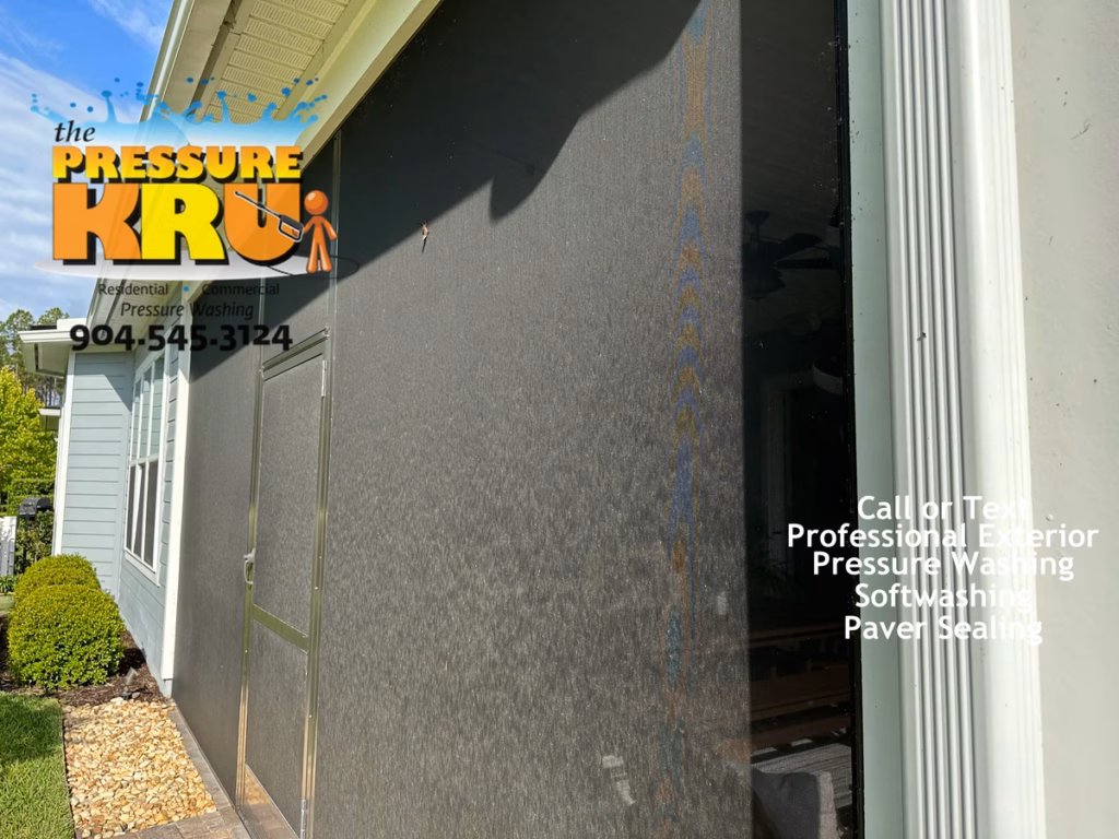Professionally soft washing screen enclosure in St. Johns, FL. before
