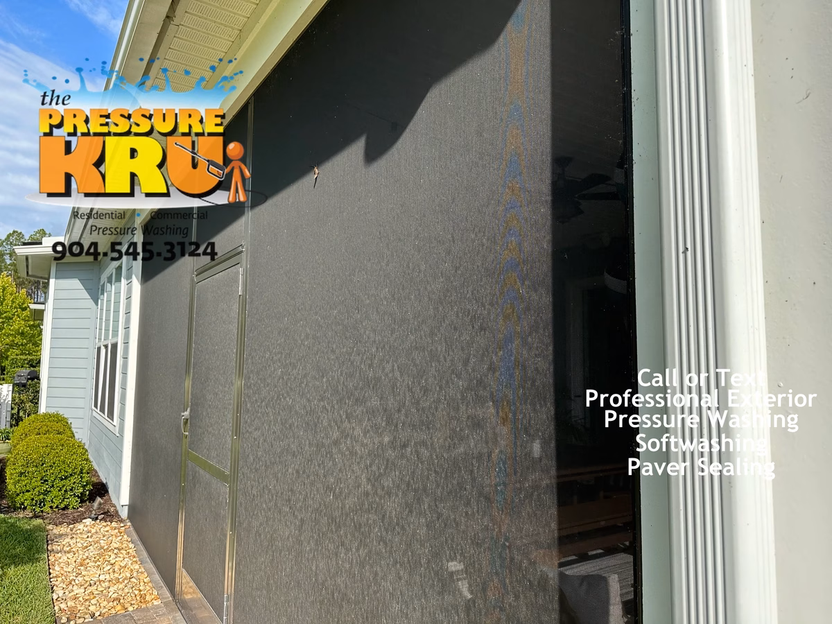Professionally soft washing screen enclosure in St. Johns, FL. before