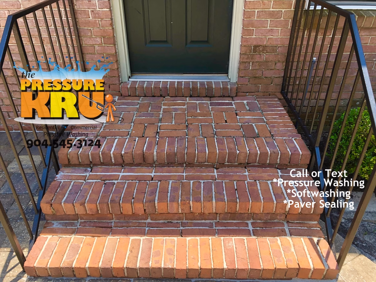 Professional brick exterior cleaning after removing algae and mildew from a home in World Golf Village