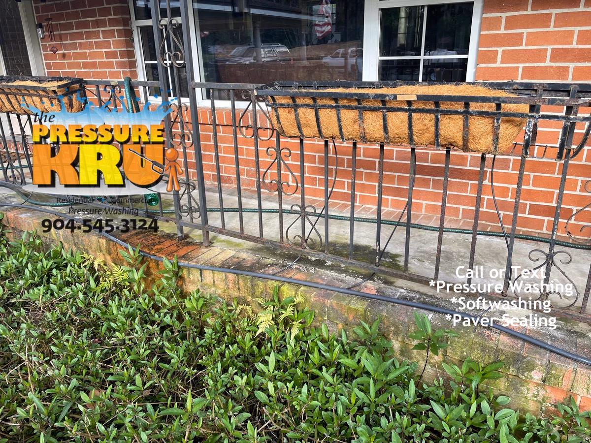 Before brick exterior cleaning on a residential home in Murabella