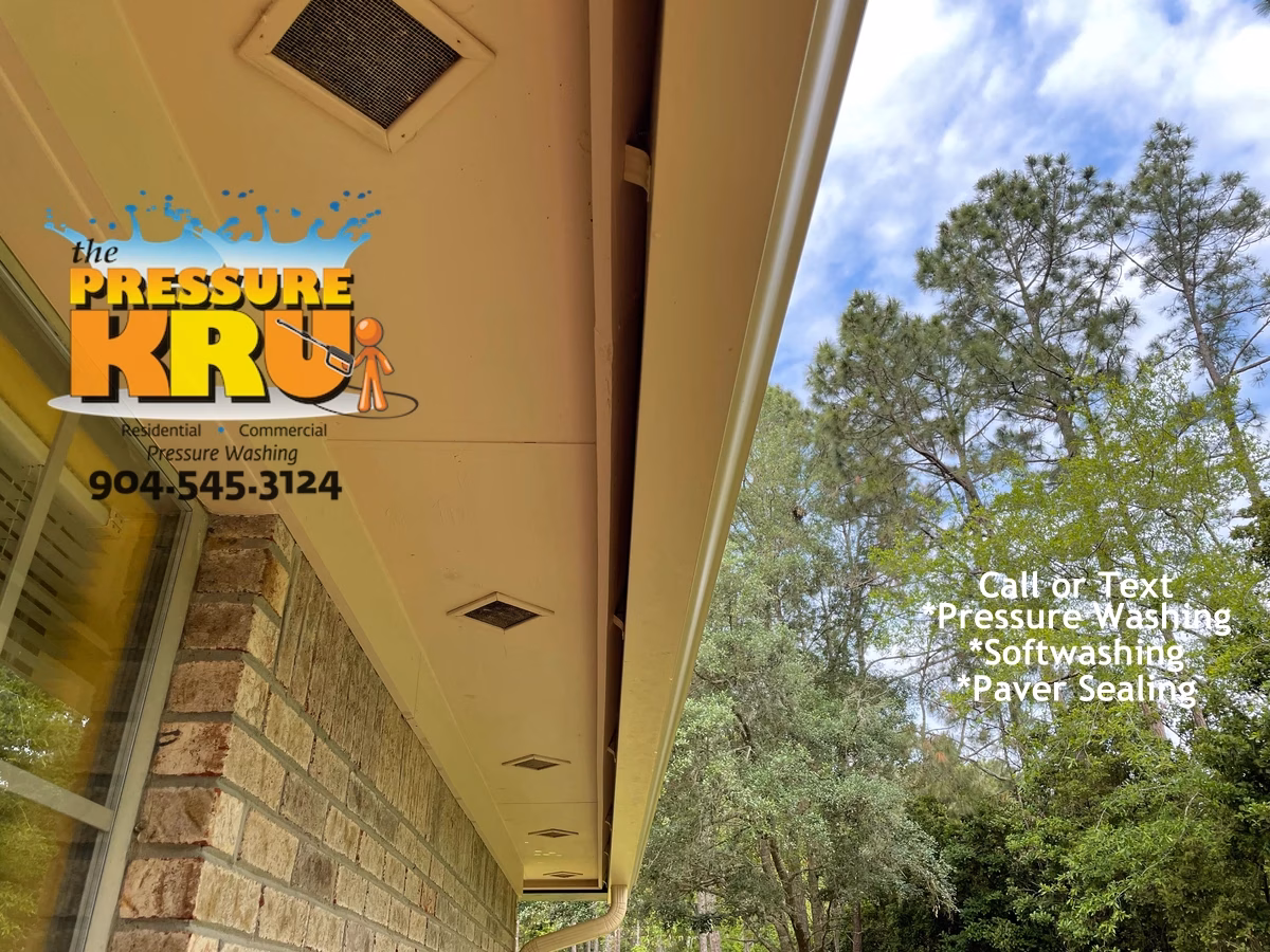 After Soft washing brick exterior of a home cleaning soffits and gutters of Jacksonville FL.