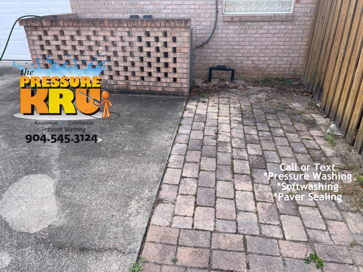 Residential brick house before professional brick exterior cleaning in Ponte Vedra Florida.