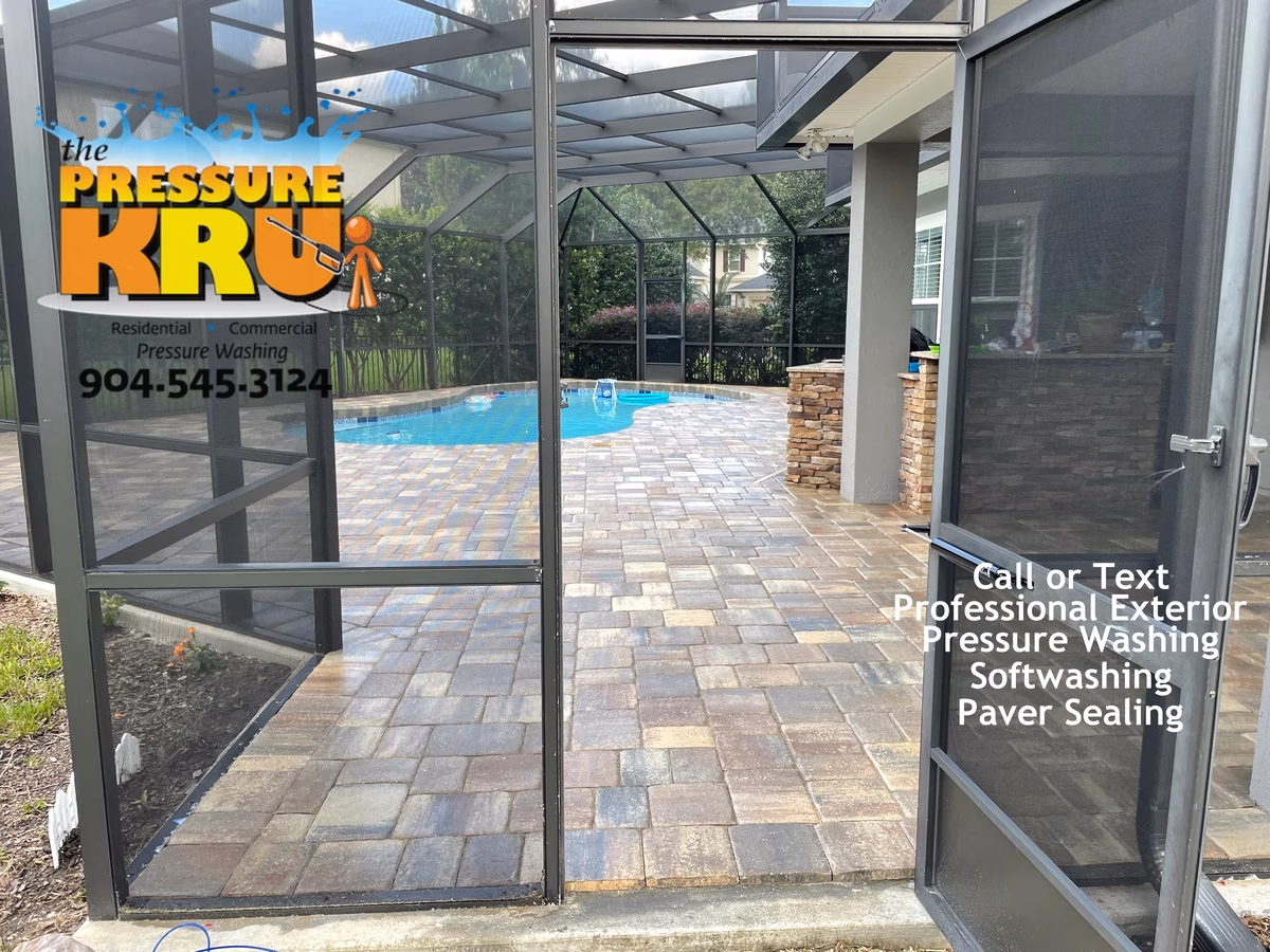 Dirty pool screen enclosure after exterior cleaning in St Johns, FL.