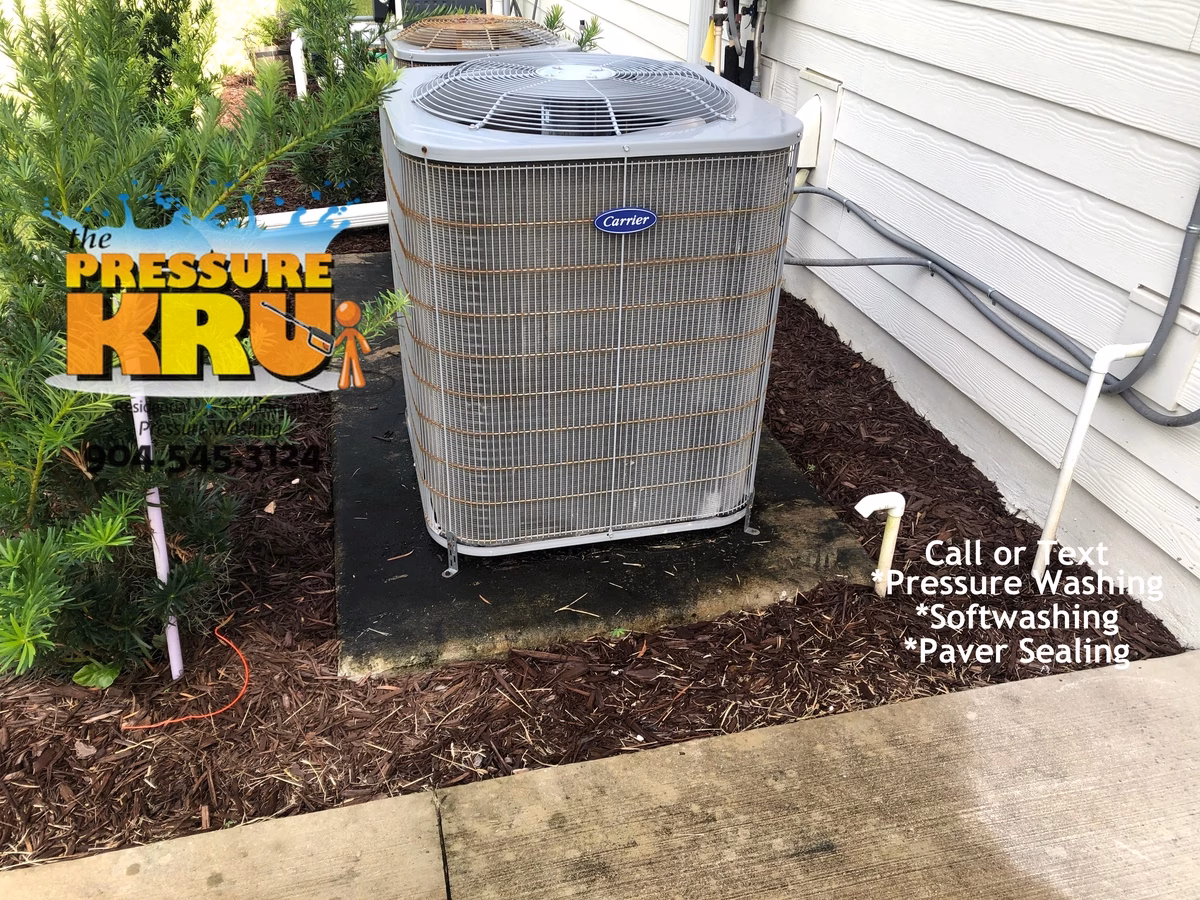 Top-rated driveway cleaning service transforming home and even A/C house keeping pad in St. Johns, FL. Before picture.