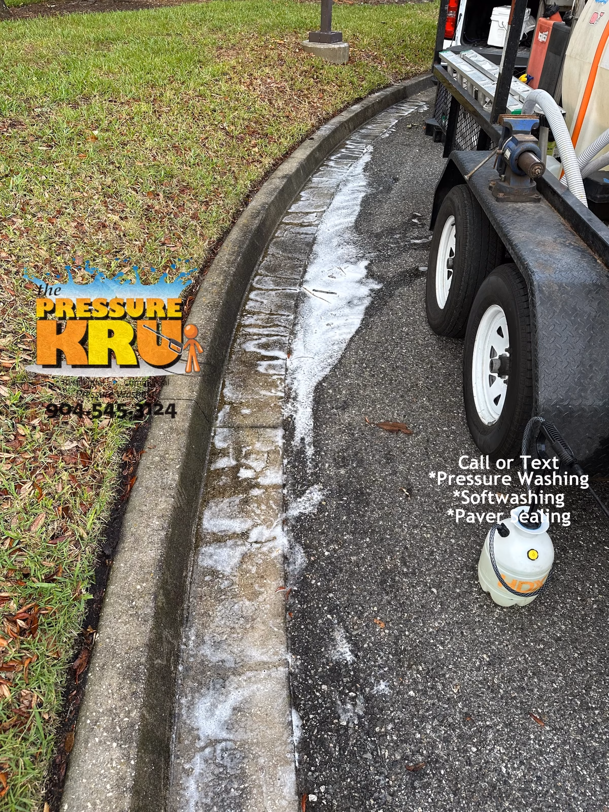 concrete curb pressure washing in St. Johns, Florida before