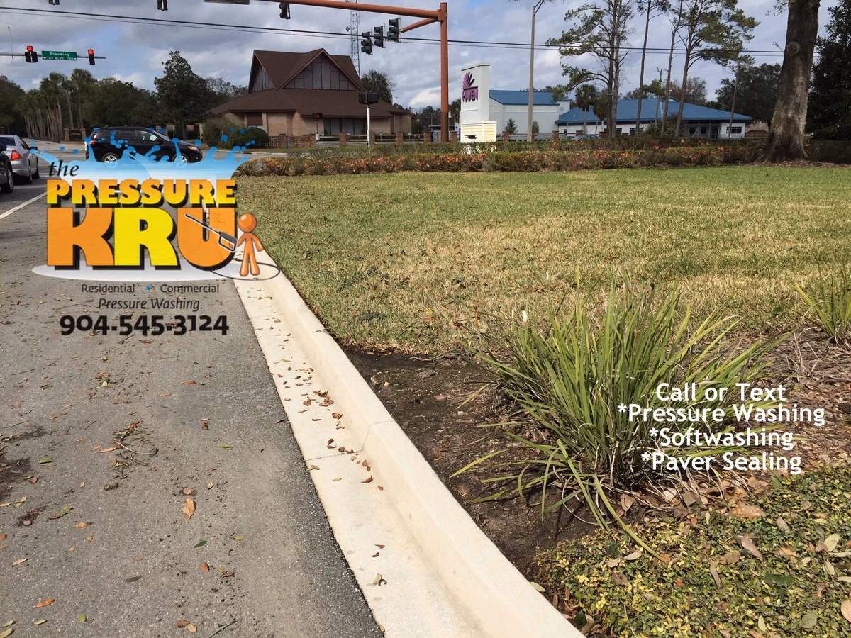 Concrete curb pressure washing in Stillwater after