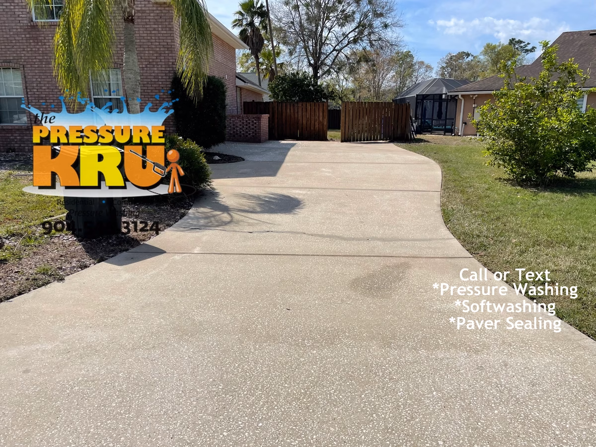 Heavy duty pressure cleaning of stained concrete driveway near St. Johns, FL. After cleaning.