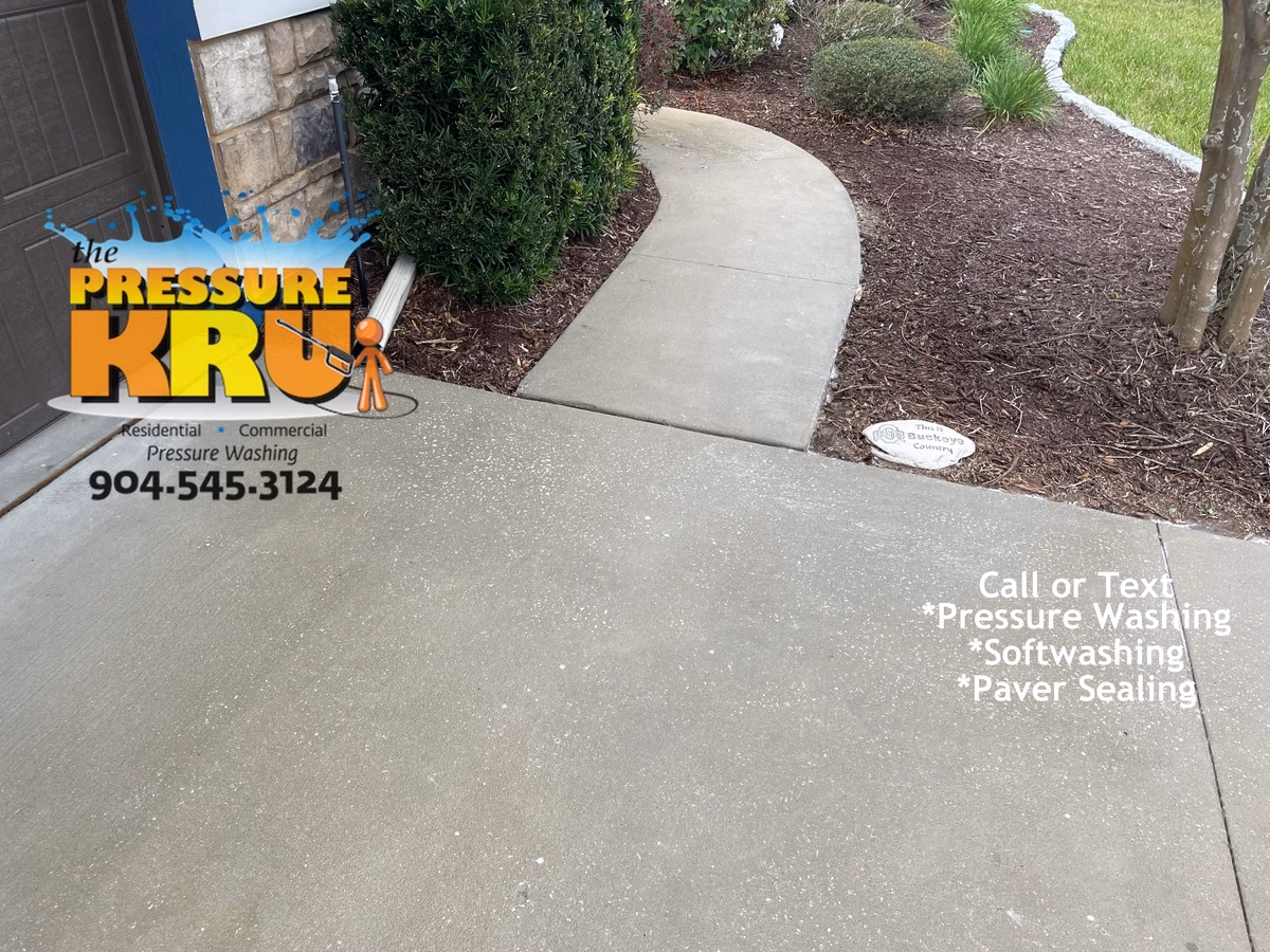 Spotless driveway entrance welcoming guest in St. Johns, FL. After picture.