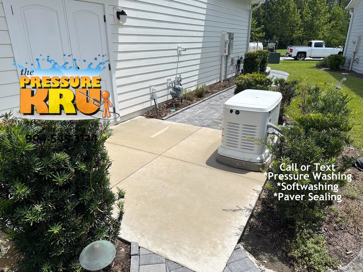 Safe pressure washing and soft washing around landscaping and flower beds in St. Johns, FL. After image showing excessive mold and algae growth completely removed.