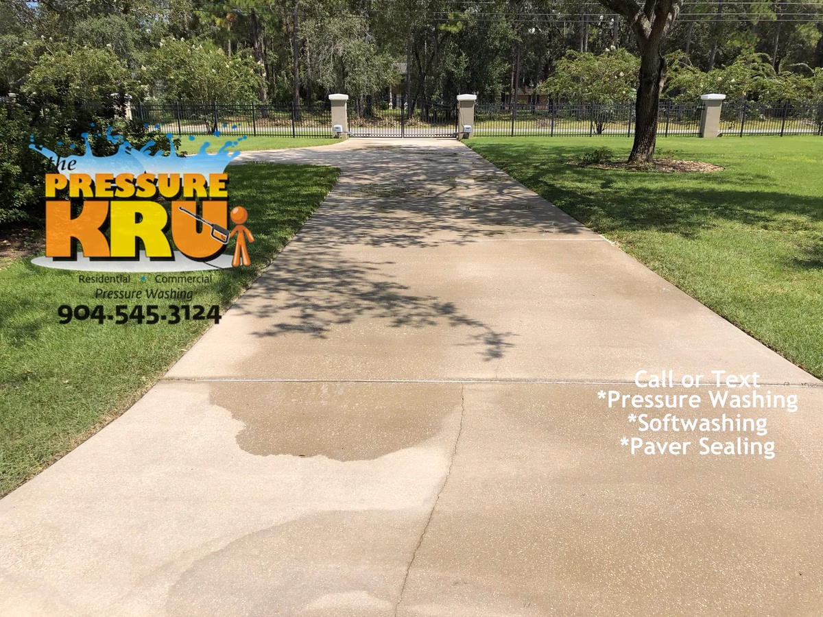 Pressure cleaning service showing attention to every detail on this driveway in Ponte Vedra, FL. After picture.