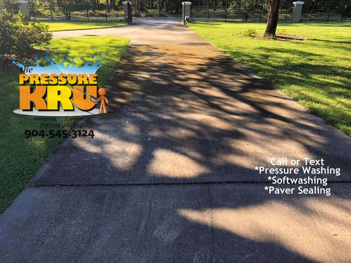 Pressure cleaning service showing attention to every detail on this driveway in Ponte Vedra, FL. Before picture.