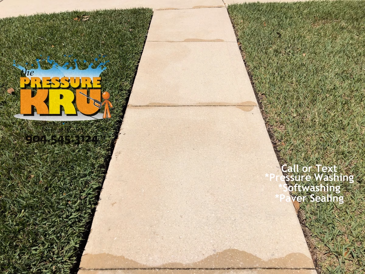 Local St. Augustine, FL pressure washing for multi-vehicle driveways and sidewalks in St. Augustine, FL. After picture.