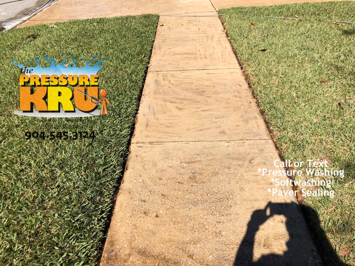 Local St. Augustine, FL pressure washing for multi-vehicle driveways and sidewalks in St. Augustine, FL. Before picture.