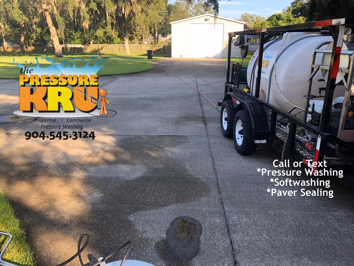 Professional driveway cleaning elevating your home's first impression in St. Johns, FL. Before picture.