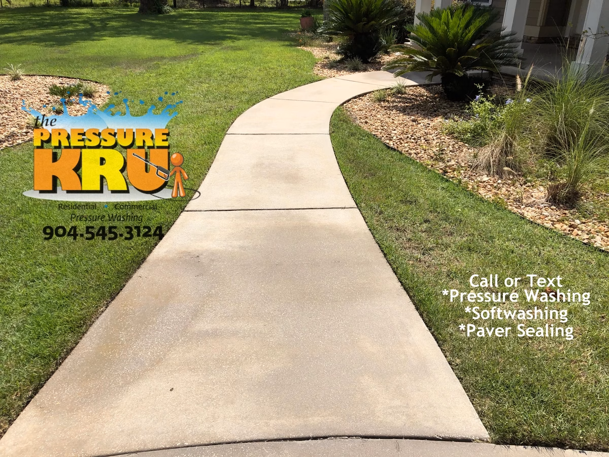 Soft washing technique preserving sidewalks and driveway integrity in Ponte Vedra, FL. After completed work.