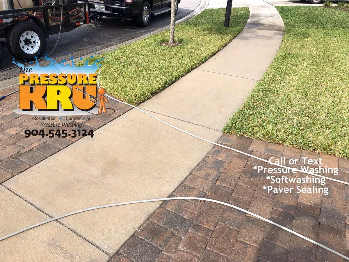Thorough cleaning around garage doors and walkways in St. Johns, FL 32259. After picture.