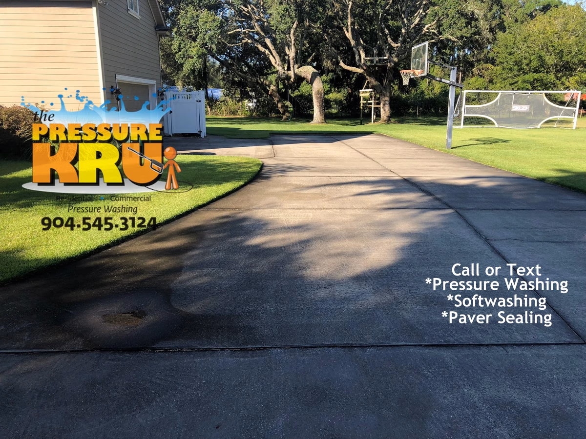 High-end driveway restoration service for luxury homes in St. Johns, FL. Before picture.