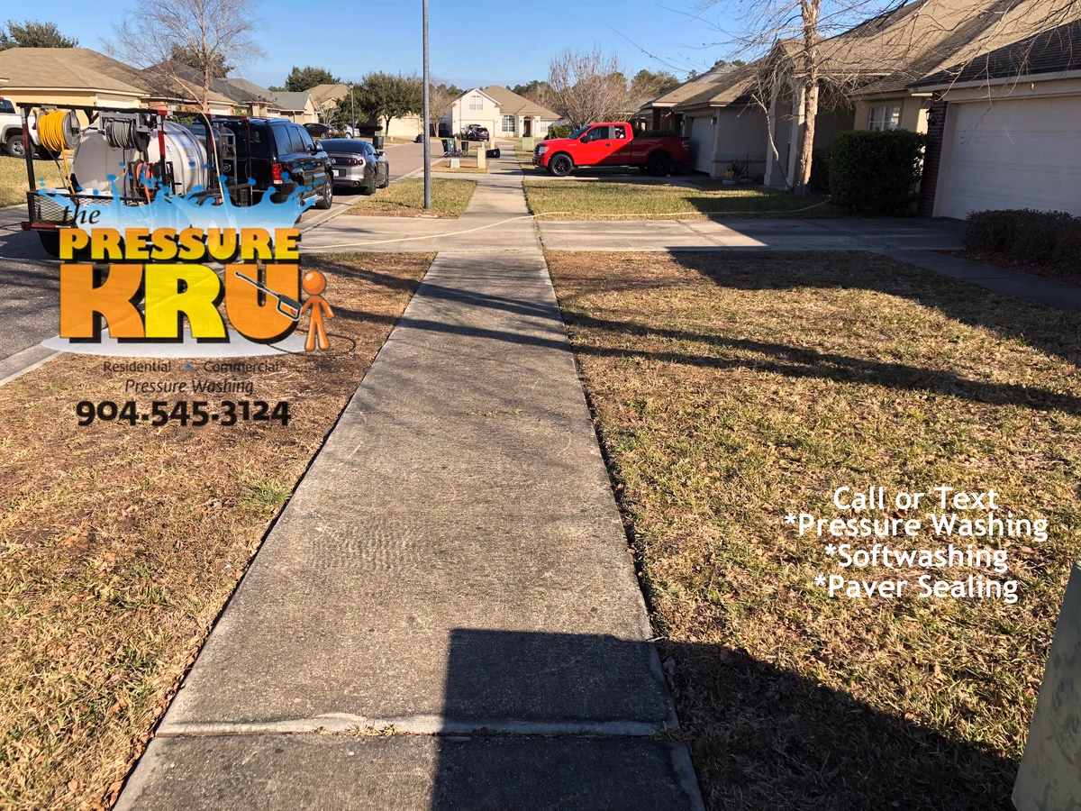 Dramatic transformation of dirty concrete driveway near St Johns FL before cleaning image.