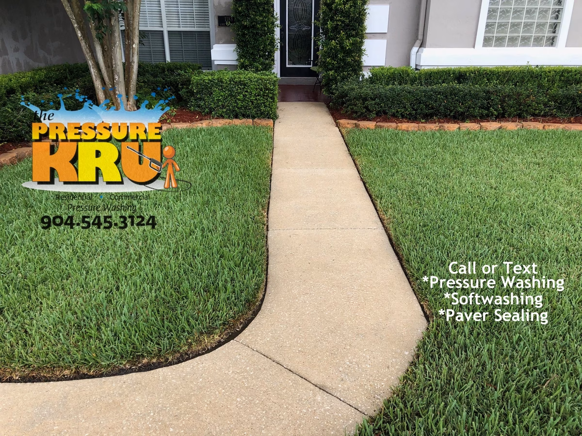 Spring driveway cleaning service to remove mold and algae in St. Augustine, FL after work.