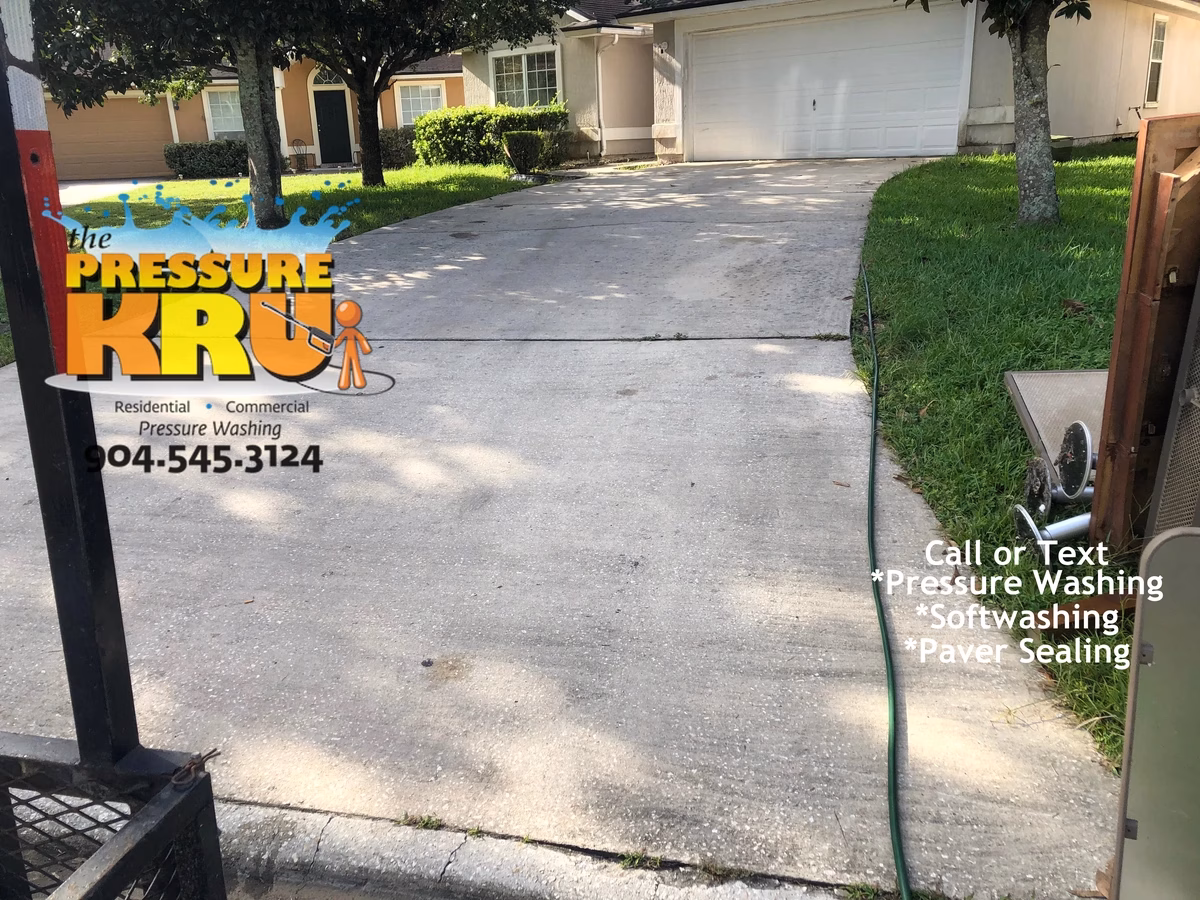 Driveway pressure washing service with same-day availability in St. Augustine, FL near Arbor mill. Before cleaning started.