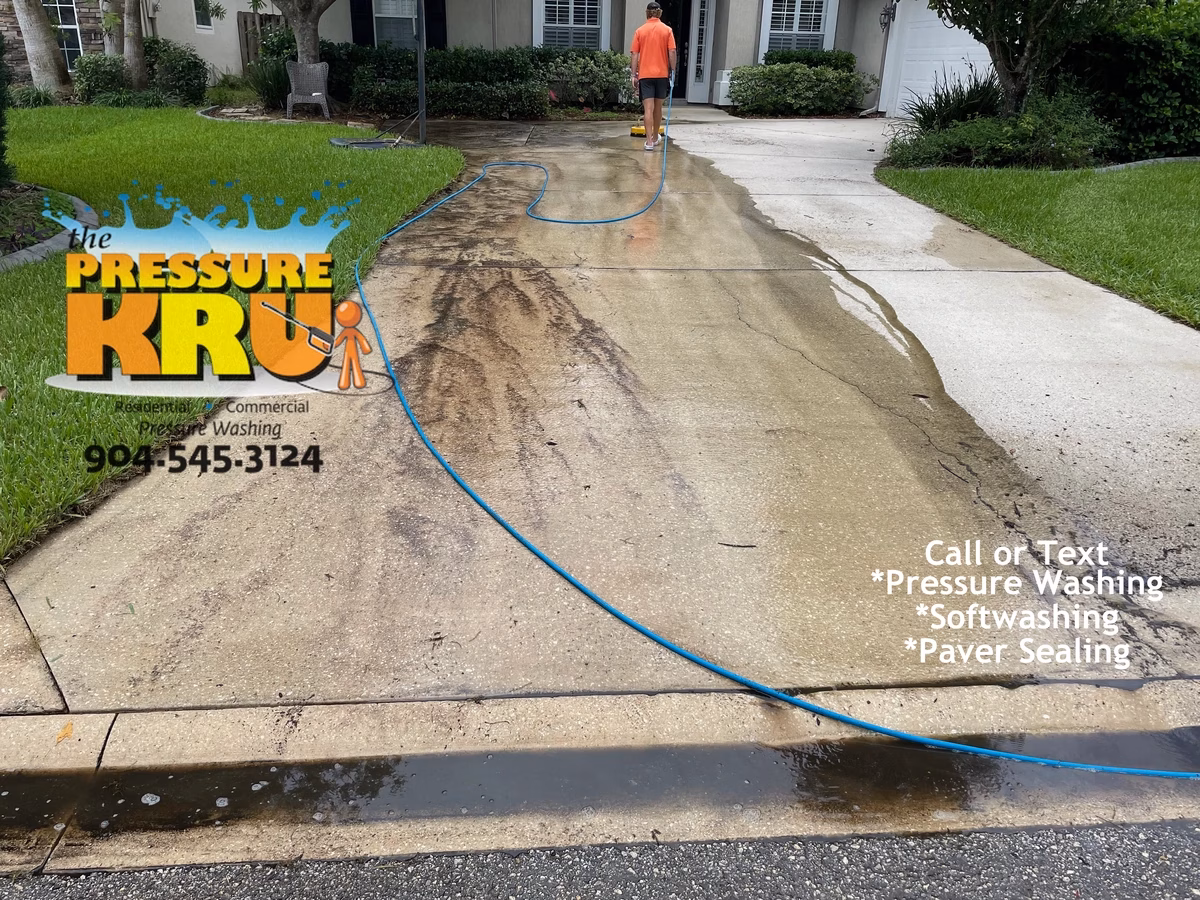 Gentle yet effective cleaning for concrete driveway in St. Augustine, FL before starting work.