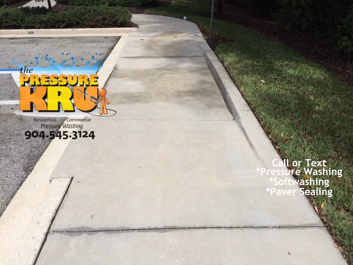 Professional concrete curb cleaning in Rivertown after